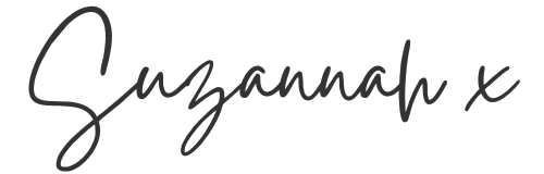 The name “Suzannah x” written in a cursive script.
